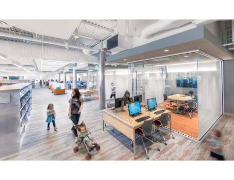 One of several glass enclosed group study rooms