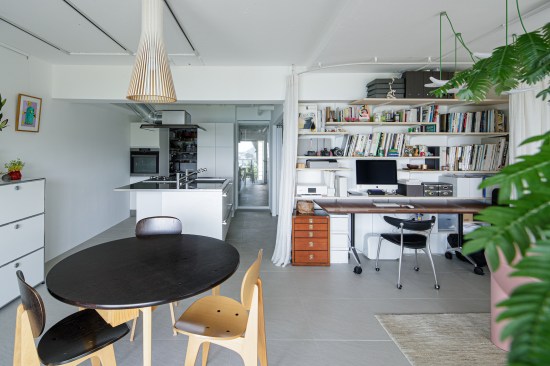 The bathroom can be hidden behind sliding doors