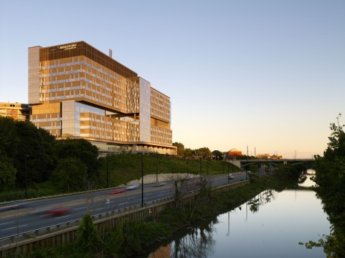 View of the 10-story building from the north with the Don River in the foreground.