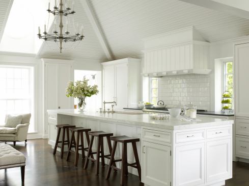 With an artful combination of finishes, textures, and materials, an all-white kitchen has the chance to be even more visually engaging and easy to live in than one with color. Location: Chicago, Ill. Architect: Paul Konstant. Kitchen Designer: Mick DeGiulio. Interior Designer: Frank Ponterio. General Contractor: Thomas Eick Construction.