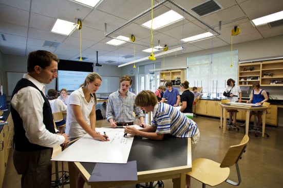 The building features four discipline-specific science lab rooms.