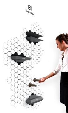 Impress, by New Zealand designer Ben de la Roche, is a refrigeration wall that keeps your food and drinks out in the open, rather than behind closed doors. Each individual chamber does not refrigerate unless there is something in it, which helps to conserve energy.