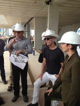 Miami Art Museum director Thom Collins (left) and Jacques Herzog, Hon. FAIA (middle) at the construction site.