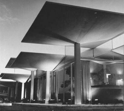 Parasol+roof+made+of+75+concrete+umbrellas+joined+with+plastic+at+new+resort+motel.