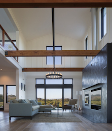 Perhaps everyone’s favorite example of how the views help connect the home’s indoor and outdoor spaces can be seen in the living room.