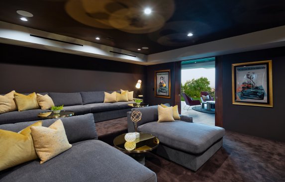 Modern bedroom lounge with jetliner views.