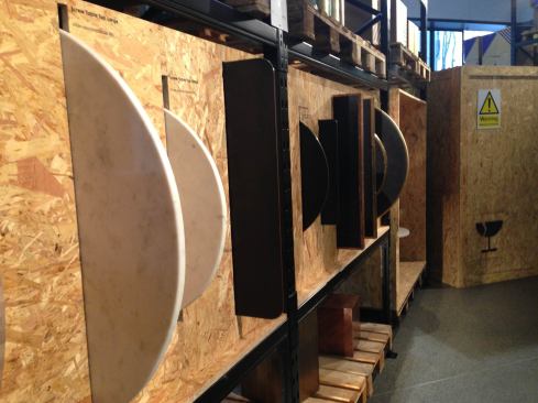 Tom Dixon table tops, still in 'packaging,' for MOST.