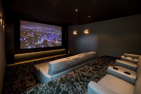 Modern Beverly Hills home luxury movie theater room.