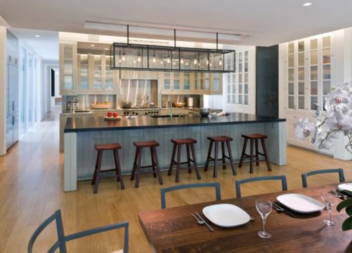 The kitchen opens onto a casual dining area.