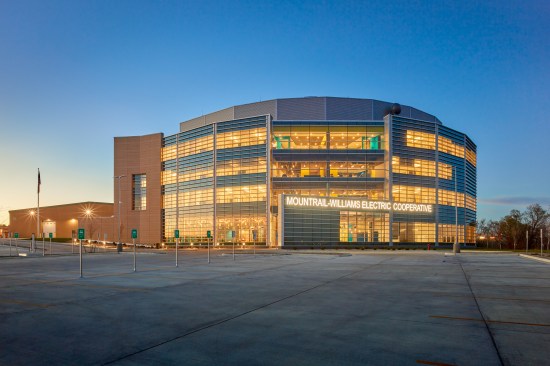 The transparency of MWEC's glass and Tubelite's aluminum systems frame the active, productive offices and collaborative workspaces within the new, modern, corporate headquarters.