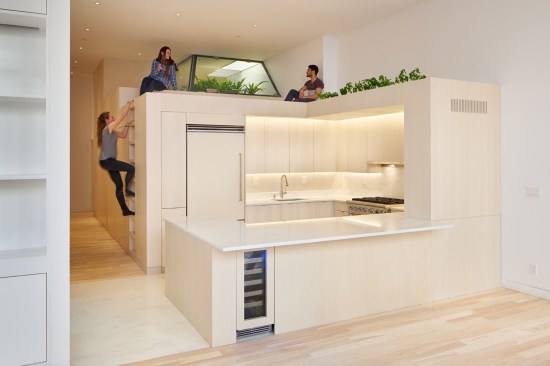 The lower units contain cores that group kitchen, storage, and bathroom spaces.