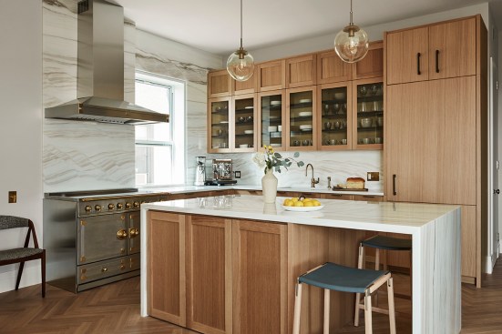 The two-sided kitchen island gives the option of sitting towards the kitchen or towards the windows with views of Central Park