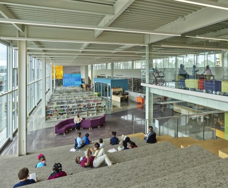 Auditorium steps connect the children’s library up to a Teen Loft that overlooks the entire library and downtown, a dynamic space symbolizing the importance of young people to the city.  Surprisingly, the open steps have drawn the local university’s students as well, choosing to study and hang out at the public library over their own campus. 