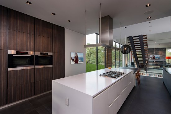 Walker Road modern open plan kitchen with central island and in-wall appliances