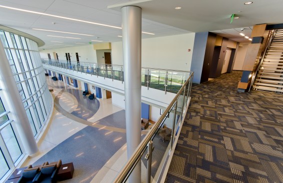 A+DNA+strand+is+represented+in+the+terrazzo+pattern+of+the+curvilinear+hall.