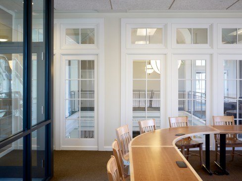 Classroom provides views to double height lobby space