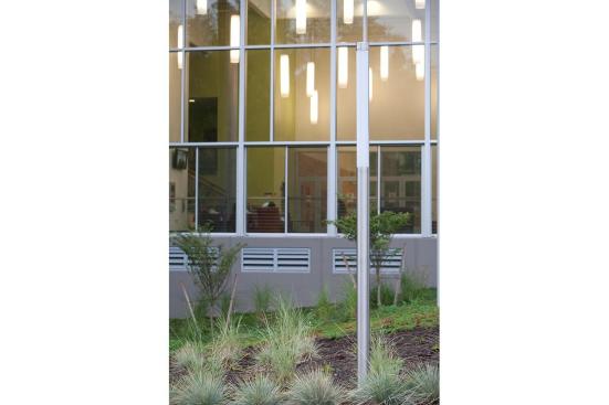 Light Column Pedestrian Lighting shown with 180 degree perforated shield at Pierce College Fort Steilacoom, Lakewood, Washington