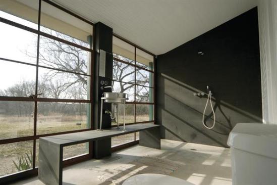 Simple forms, utilitarian components, and abundant south light lend this new bath an astringent clarity.