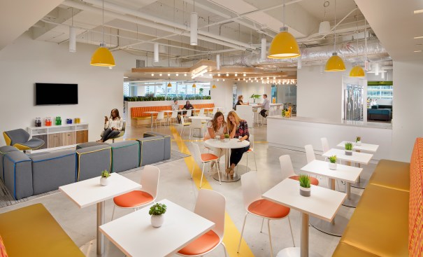 The epicenter of the new office space is Wix’s employee lounge. Pops of of yellow, green, orange and blue colors provide employees with a Miami tropical feel