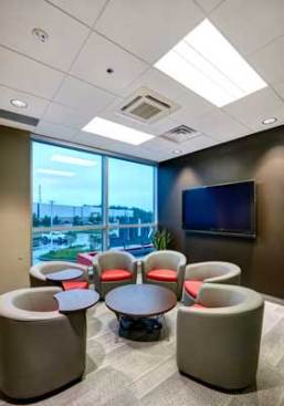 Exceptionally smooth, ROCKFON’s white, stone wool ceiling panels extend the amount of natural daylight available across the building minimizing electrical energy costs.