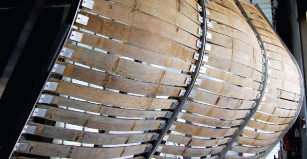 Used as a finish material, for instance in the sunscreen on the proprietor's house, shown here in mock-up (5), staves were also the inspiration for the patterning of the concrete on the interior walls of the barrel-aging rooms in the winery building. With a digital file that took the basic form of a barrel stave, the pattern was routed into a specific mixture of cast concrete, resulting in seamless panels (4).