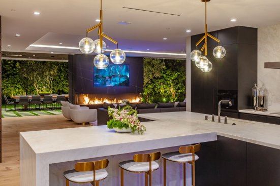Ultra luxury modern open plan kitchen at designer Los Angeles home.