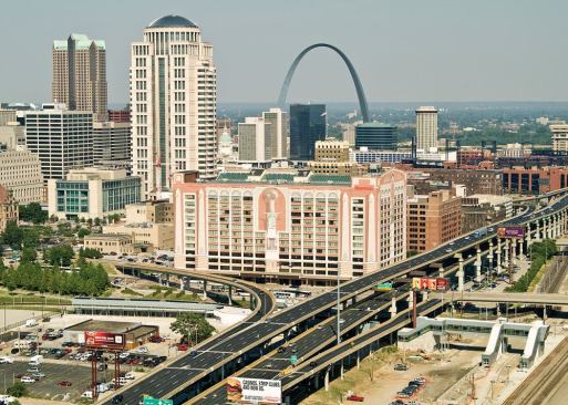 The new Gateway Transportation Center in downtown St. Louis combines Amtrak, Greyhound, and MetroLink train services into one 35,700-square-foot building which had to be worked into an oddly shaped site underneath-and around the support columns of-the Interstate 64 overpasses (at bottom).