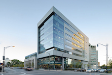 The Coleman Center’s exterior features granite-and-limestone at the base with the upper stories wrapped in 38,000 square feet of 1.5mm-thick CENTRIA Intercept™ Entyre modular metal panels manufactured using RHEINZINK prePATINA blue-grey.