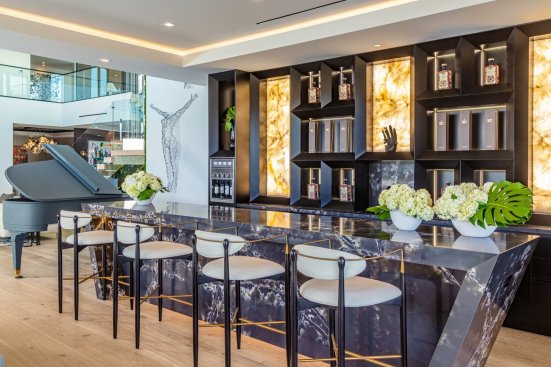 Modern Los Angeles mansion luxury wet bar and piano lounge.