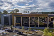 For SMC³'s office exterior wall cladding, Abrams Architectural Products fabricated and installed 6,400 square feet of flat-lock tiles using RHEINZINK-GRANUM Skygrey, provided by Sheet Metal Supply.