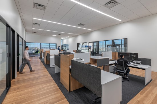 Working with the confines of the existing building, private offices were placed along the opaque side of the building while locating the open office along the expansive exterior glass.