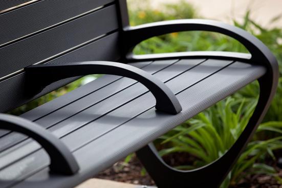 Trio Bench shown in 6 foot, backed configuration with Black Texture powdercoated frame, extruded aluminum slats and two armrests at BART, Pleasant Hill/Contra Costa Centre Station, Walnut Creek, California