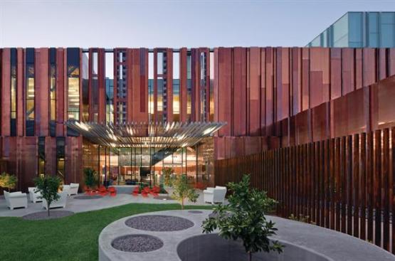 Canopies over the entrances, including the one into the children?s courtyard, provide shade to soften the transition between the harsh Phoenix sunlight and the building interior.