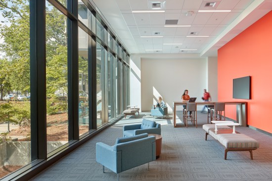 Library commemoration area in the expanded central core on first floor is used as a gathering point for tours as well as a waiting area for staff to meet each other or escorted guests. Future exhibits are planned for display of historic SMUD artifacts and visitors will be able to access a historic database through embedded technology in the room.