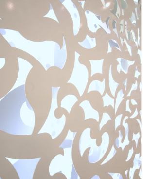 The design layers patterns. The lighting scheme helps to support and develop the pattern motif. LED tapelight is mounted behind the metal screen, casting light onto a reflective painted pattern.