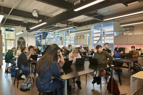 The existing school building was converted into four classrooms to accommodate the growing student population.