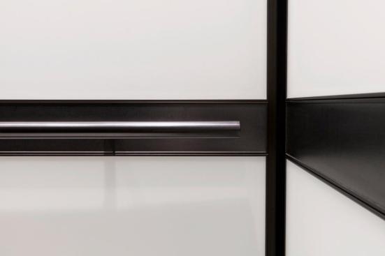 LEVELe-105 Elevator Interior with main panels in ViviChrome Chromis glass with White interlayer and Opalex finish; handrail panels in Fused Graphite with Sandstone finish; Round Handrails in Oil-Rubbed Bronze at the Brandywine Building, Wilmington, Delaware