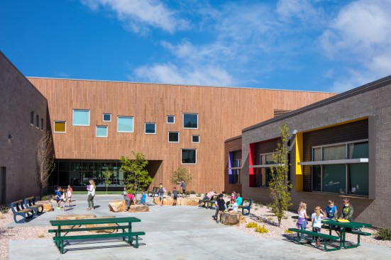 Thought was given to how educational activities could spill outside. Color highlights on the exterior facade hint connect back to the bold use of color on the interior.  