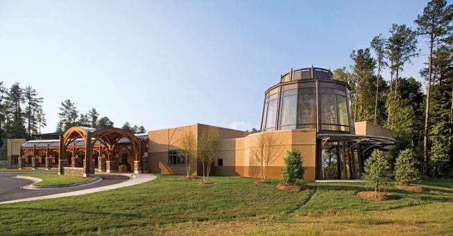 This healthcare center is the first facility designed solely for the combined practice of alternative treatments and conventional medicine. The woodland setting is integral to the design as befits a program in which nature and technology coexist.