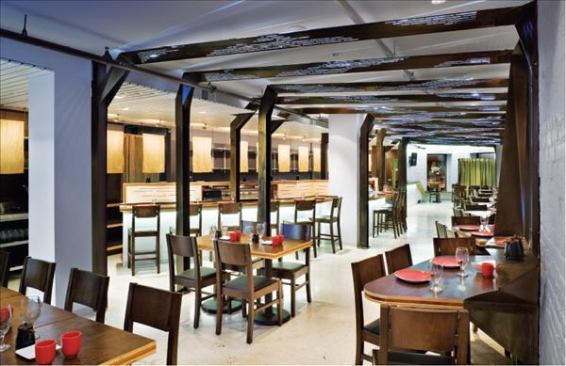 The focal point of Fin's interior is a series of folded metal beams, lit from within by strips of LEDs. Because of a relatively tight budget, many other base building elements were left untouched.