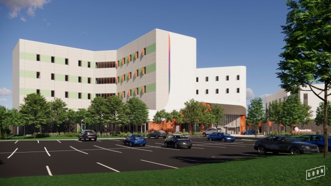 Dichroic (color changing) glass fins on the exterior facade and in an oculus in the lobby enhance a feeling of transparency and welcome, inviting curiosity and creating interest.