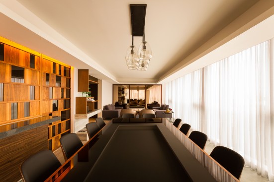 The ZE project shows an absolute sobriety that is expressed in its palette of colors and materials. Grey and wood tones, achieves a synergy between the finishes and the furniture. Each space at the apartment is designed with a unique character and for a specific function.

The kitchen is designed with stylized sliding doors that allow both, to keep it hidden or relate it to the dining room.

In the living room, the TV screen is hidden behind some elegant framed mirrors; the area relates naturally with the dining room. The breakfast room is located next to the family room because of the idea of maximizing spaces creating a cozy family area. 

The bedrooms are located in the private area of the apartment; the main room takes advantage of one of the walls to use it as a headboard, achieving a sense of breadth and depth in the space.

The apartment is a project with subtle details, from the furnishings to lighting, manages to convey its main essence: sobriety and elegance.
The ZE project shows an absolute sobriety that is expressed in its palette of colors and materials. Grey and wood tones, achieves a synergy between the finishes and the furniture. Each space at the apartment is designed with a unique character and for a specific function.

The kitchen is designed with stylized sliding doors that allow both, to keep it hidden or relate it to the dining room.

In the living room, the TV screen is hidden behind some elegant framed mirrors; the area relates naturally with the dining room. The breakfast room is located next to the family room because of the idea of maximizing spaces creating a cozy family area. 

The bedrooms are located in the private area of the apartment; the main room takes advantage of one of the walls to use it as a headboard, achieving a sense of breadth and depth in the space.

The apartment is a project with subtle details, from the furnishings to lighting, manages to convey its main essence: sobriety and elegance.

The ZE project shows an absolute sobriety that is expressed in its palette of colors and materials. Grey and wood tones, achieves a synergy between the finishes and the furniture. Each space at the apartment is designed with a unique character and for a specific function.

The kitchen is designed with stylized sliding doors that allow both, to keep it hidden or relate it to the dining room.

In the living room, the TV screen is hidden behind some elegant framed mirrors; the area relates naturally with the dining room. The breakfast room is located next to the family room because of the idea of maximizing spaces creating a cozy family area. 

The bedrooms are located in the private area of the apartment; the main room takes advantage of one of the walls to use it as a headboard, achieving a sense of breadth and depth in the space.

The apartment is a project with subtle details, from the furnishings to lighting, manages to convey its main essence: sobriety and elegance.
Apartment ZE by Kababie Arquitectos

