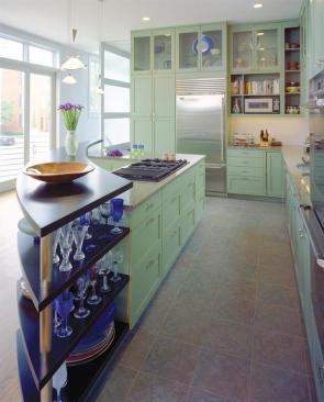 The kitchen is the stylish focal point of the living level.