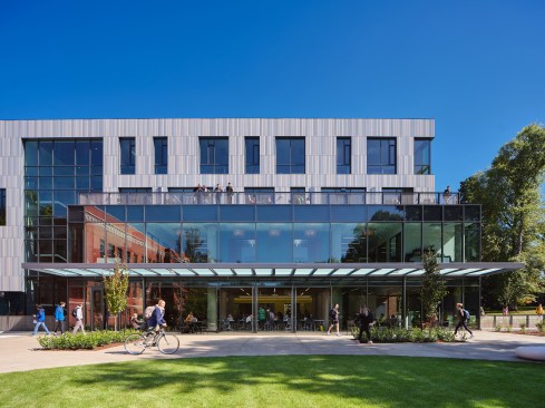 Intended to serve as a campus destination, the building transforms the area with a cohesiveness that strengthens internal and external connectivity of pedestrian circulation and public gathering spaces.  On the ground level, a community event and flexible gathering space called the Commons opens directly onto a new outdoor courtyard.  The Commons’ roof terrace vegetation promotes biodiversity, and storm water from the roof collects in rain garden to return it to the aquifer. UO Tykeson Hall, OFFICE 52 Architecture, Design Architect.