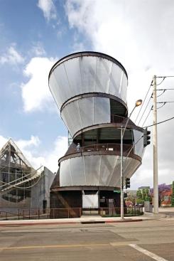 Riders of L.A.'s imminent light-rail line won't need to rely on their Kindles for entertainment. The panes of acrylic bridging the gaps between the Samitaur Tower's five offset rings serve as projection screens, which will showcase films and video art for commuters' pleasure.
