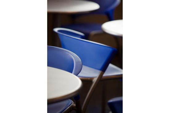 Bantam Chairs shown in Blueberry and Column Tables with Table Tops in Stainless Steel with Sandstone finish at University of California - Davis, Davis, California