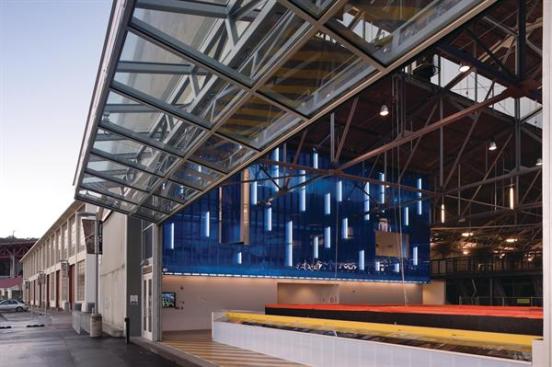 The facility is marked by a 45-foot-long glass bifold door.