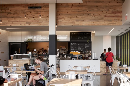 Hardy Coffee Co. provides a ground-floor gathering space for area residents, tenants, and students from the adjacent Creighton University satellite, which is focusing on community health initiatives.
