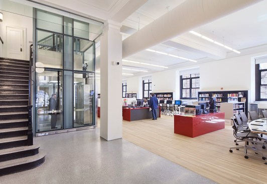The+ground+floor+deign+improves+accessibility+with+a+new+entry+configuration+and+a+limited-use+elevator+to+provide+access+between+the+foyer+and+the+main+reading+room+floor.
