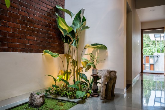 Koi pond and small garden add to the vibrancy of the central court